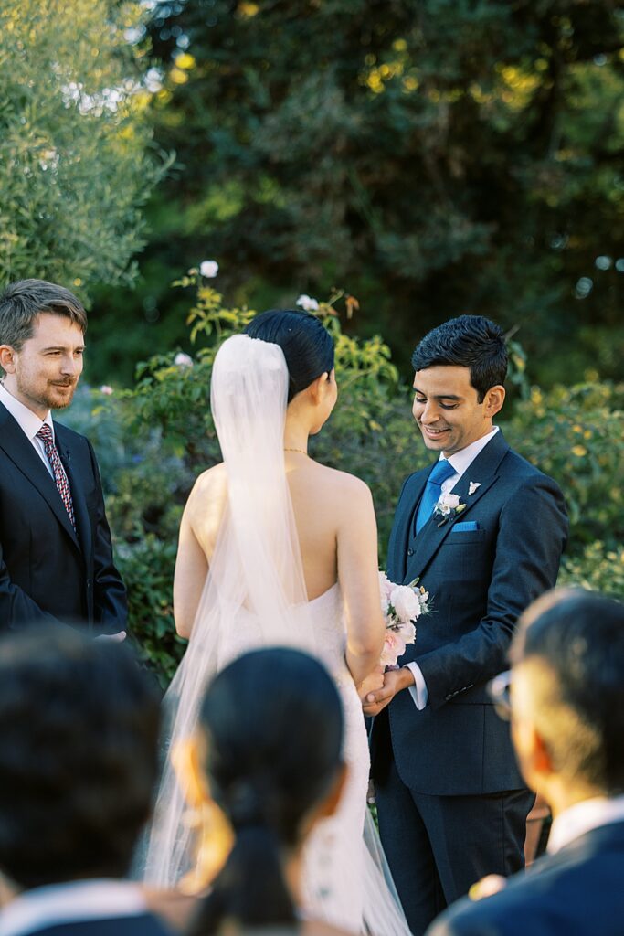 La Playa Hotel Wedding exchanging vows