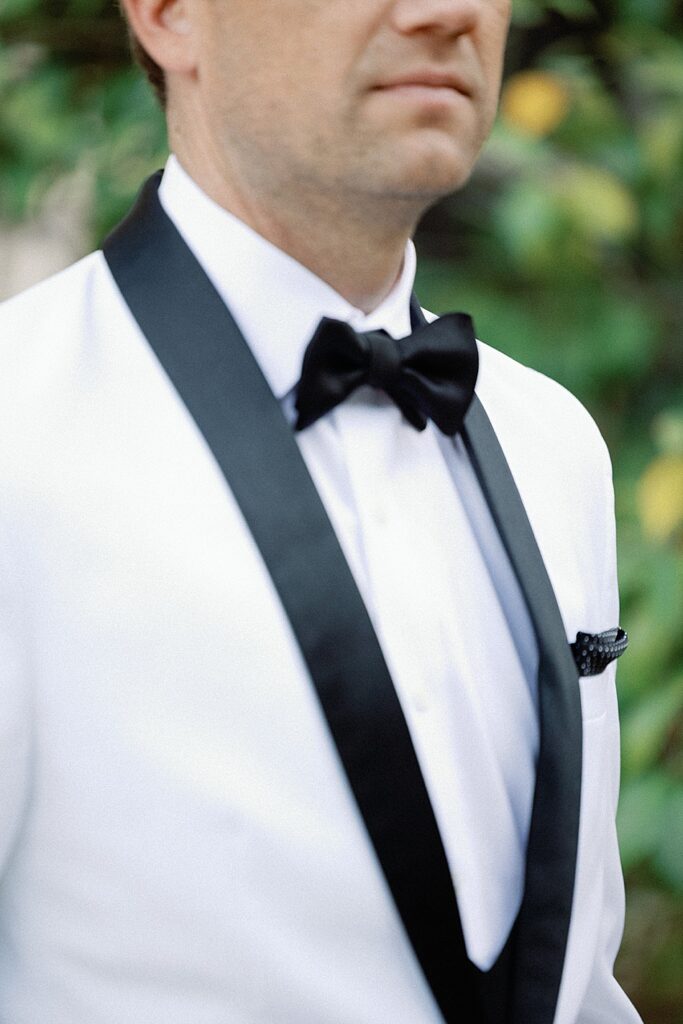Groom in White Tuxedo